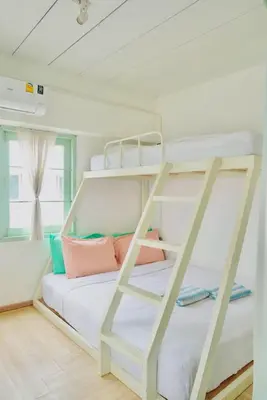 a bunk bed room with two bunk beds at The Green Khaosan Bangkok in Bangkok