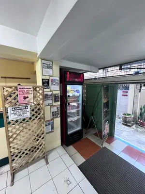 an entrance to a store with the door open at Kanyakorn House Near Khao San in Bangkok
