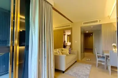 a living room with a white couch and a table at Luxury condo right next to BTS Thonglor! in Bangkok