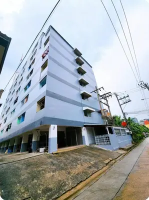 a white building with balconies on the side of it at 803-STP Homely room Free Wi-Fi and Near BTS line in Bangkok
