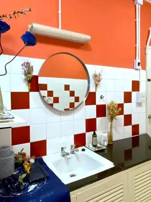 a bathroom with a sink and a mirror at Entire House 6 people 3Beds 2Baths near BTS Asoke Terminal21 in Bangkok