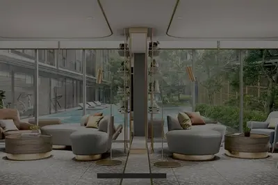 a lobby with couches and chairs in a building at Luxury and cozy apartment in the City center in Bangkok