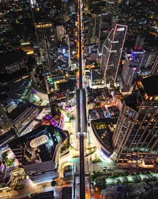 an aerial view of a city at night at EM HOME Sukhumvit Bangkok - near Terminal 21, EM District Malls, BTS and MRT Lines in Bangkok