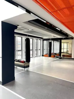 a large room with boxing equipment in a building at Luxurious River View chao phraya river in Bangkok