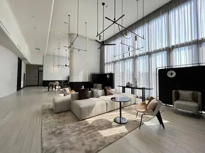 a large living room with a couch and a table at Luxurious River View chao phraya river in Bangkok