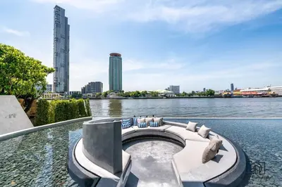 a pool in the middle of a body of water at Luxurious River View chao phraya river in Bangkok