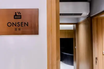 a sign on the wall of a hospital room at BTS Thonglor - Serene Japanese-style Haven, Onsen in Bangkok