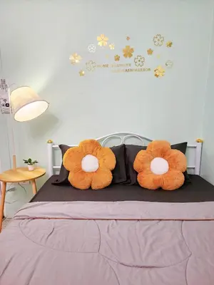 two stuffed animals sitting on top of a bed at 811-STP Homely room Free Wi-Fi and Near BTS Line in Bangkok