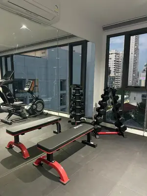 a gym with two treadmills and a treadmill at 6th Avenue Sukhumvit 305 BTS Asoke & Nana MRT Sukhumvit in Bang Kapi
