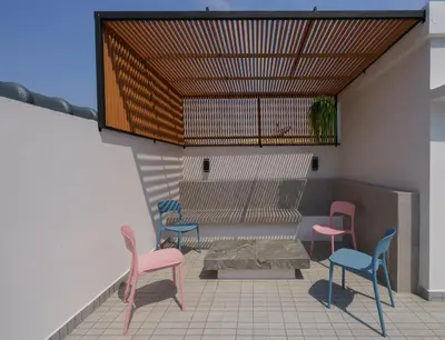 a group of chairs and a table on a patio at Cozy Spacious 4BR Villa, 12pax, 200m BTS PhraKhanong, 10min ThongLo, Fast 500mbps Wifi in Bangkok