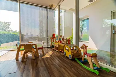 a childs room with a table and a toy train at Thonglor Area 1 bedroom Check in 24h Fast WiFi 98 in Bangkok