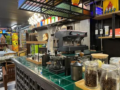 a kitchen with a coffee maker on a counter at Years 1981 in Bangkok