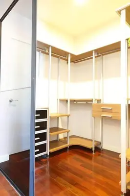 a room with several bunk beds and a wooden floor at Townhome 3 bed4 Baht Asok MRTBTS Sukhumvit 16 in Bangkok