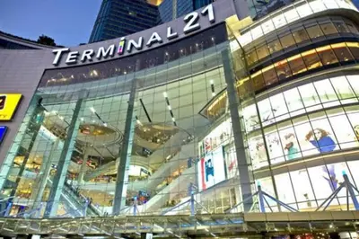a building with a sign on the side of it at Townhome 3 bed4 Baht Asok MRTBTS Sukhumvit 16 in Bangkok