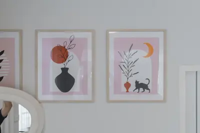 three pictures of vases and a cat on a wall at Huai Khwang Cozy Home Comforts in Bangkok