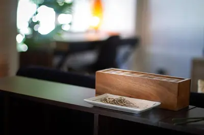 a box of chocolates sitting on a table at Spacious 4-Bedroom Oasis in the Heart of Sukhumvit in Bangkok