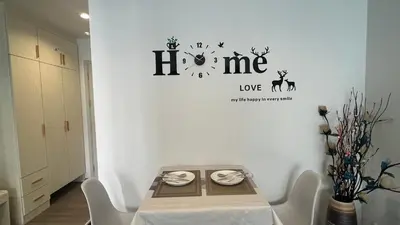 a room with a table with two plates on it at GM bangson home in Bangkok