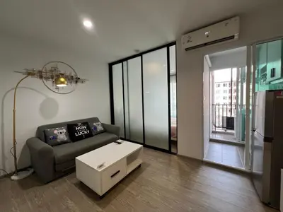 a living room with a couch and a coffee table at GM bangson home in Bangkok