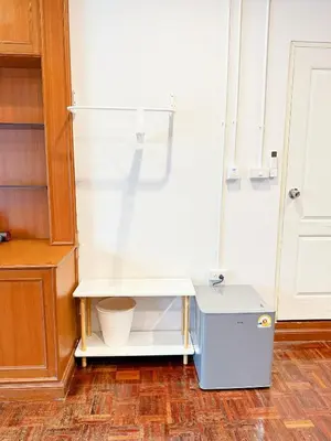 a kitchen with a white sink and a cabinet at xx Stay On Sukhumvit 11 BTS Nana in Bangkok