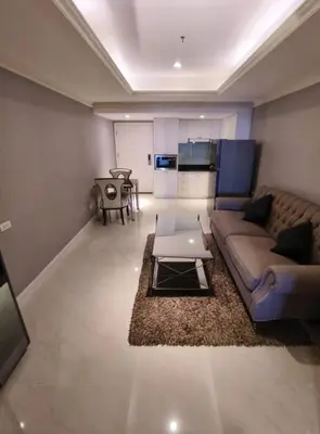 a living room with a couch and a table at NEW 1 bedroom 46FL Bangrak City view in Chinatown