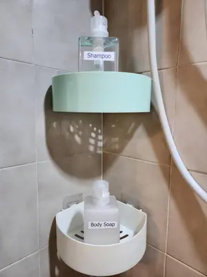 a bottle of baby soap in a dispenser in a bathroom at 703-STP Homely room Free Wi-Fi and Near BTS line in Bangkok