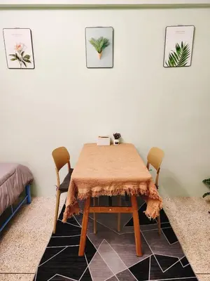 a dining room table with two chairs and a tableablish at 703-STP Homely room Free Wi-Fi and Near BTS line in Bangkok