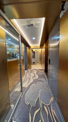 a room with a hallway with a carpet on the floor at Golden Mango home hotel \u91d1\u8292\u679c\u4e4b\u5bb6\u9152\u5e97 in Bangkok