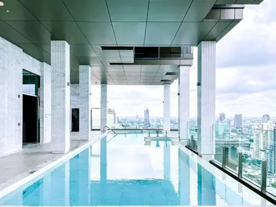 a swimming pool on the top of a building at 1million Dollar Stunning Ultra Luxury Phrom Phong Sleeps 4 Sky Pool in Bangkok