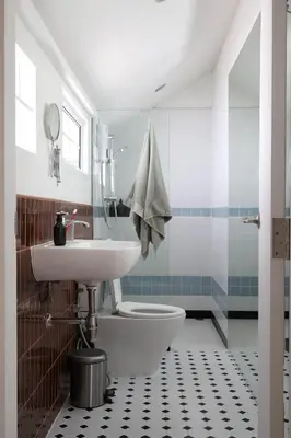 a bathroom with a sink and a toilet at House 33 in Bangkok