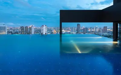 a view of a city skyline from the top of a building at 1 Bedroom Condo Pool Gym BTS Cowork Sky in Godown