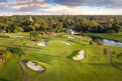 an overhead view of a golf course with three eighteenth greens at River View Active 7 in Bangkok