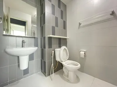 a bathroom with a toilet and a sink at Studio123 at changwattana in Ban Bang Phang