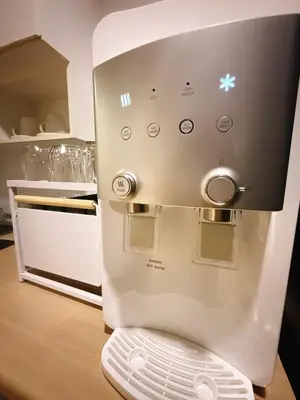 a microwave oven sitting on top of a kitchen counter at 2BR - MRT Lak Song 5 Minute - Garden-Gym-Pool-wifi in Ban Khlong Khwang Klang