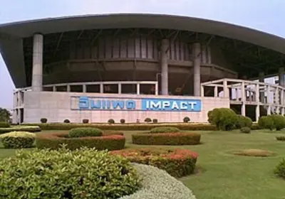 a large building with a sign in front of it at Studio71 at changwattana in Ban Bang Phang