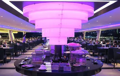 a dining room with a large chandelier in the middle at River View Active 6 in Bangkok