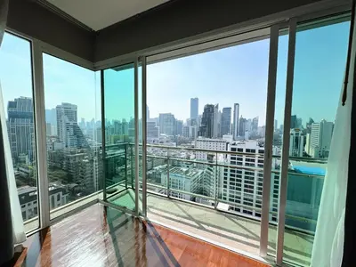 an empty room with a view of a city skyline at The Prime 11 Sukhumvit 11 2BR near BTS Nana in Bangkok