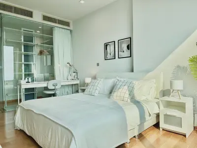 a white bedroom with a bed and a desk at Luxury 2Bed Duplex - 1min From Thonglor BTS in Bangkok