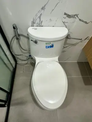 a bathroom with a white toilet in a room at The Gabriel House in Ban Bang Khen (1)