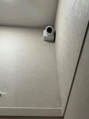 a camera in the corner of a room at The Gabriel House in Ban Bang Khen (1)