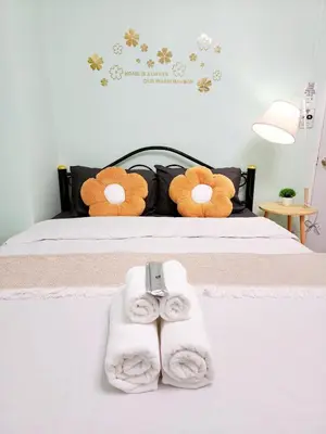 a bedroom with a bed with towels on it at 202-STP Homely room Free Wi-Fi and Near BTS in Sathani Bang Khen