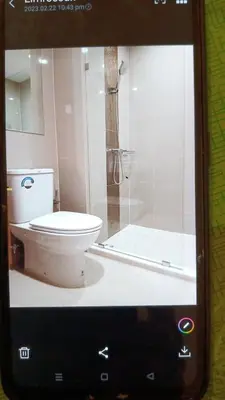 a picture of a bathroom with a toilet and a shower at Cyber carer NSW in Bangkok Yai