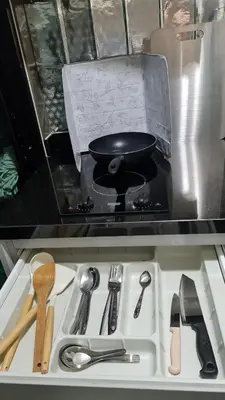 a frying pan sitting on top of a stove at 1Br HiSpeed Net, Low rise condo, Near BTS Ekamai in Khlong Toei