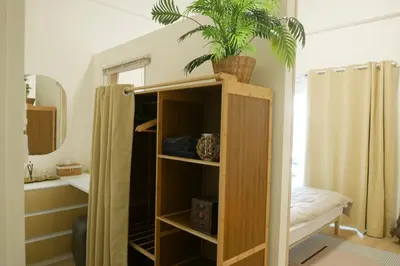 a plant sitting on top of a shelf in a bathroom at Enjoyo getaway in Ban Zong Katiam