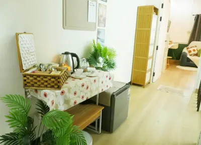 a room with a table with a table cloth at Enjoyo getaway in Ban Zong Katiam