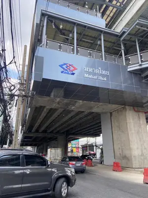 a car parked in front of a building at Cozy Homey Place Townhome in Bangkok