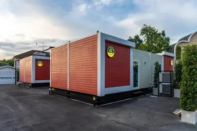 a row of modular homes in a parking lot at NY Resort Nonthaburi in Nonthaburi