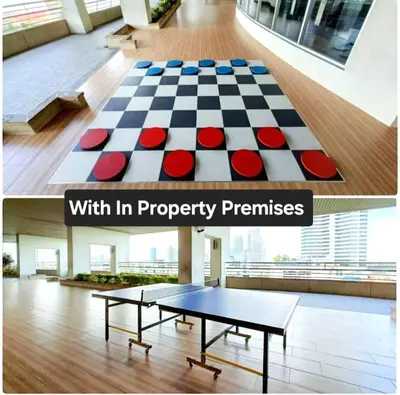 a chess board on a floor in a room at River View 8 in Yan Nawa