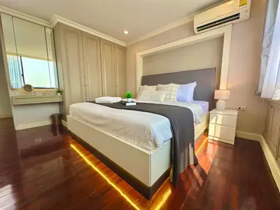 a bedroom with a large bed in a room at Luxury 3 bedrooms in the heart of the city in Bangkok