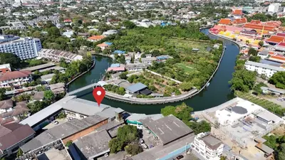 an aerial view of a river in a city at Canal Villa on Onnut Road, near Bts Onnut, Bangkok in Amphoe Phra Khanong