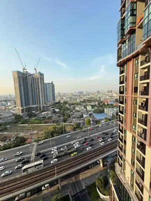 a view of a highway in a city with buildings at 1 bedroom condo, next to BTS Talat Phlu, 0 meters, near Iconsiam, monthly room available in Bangkok